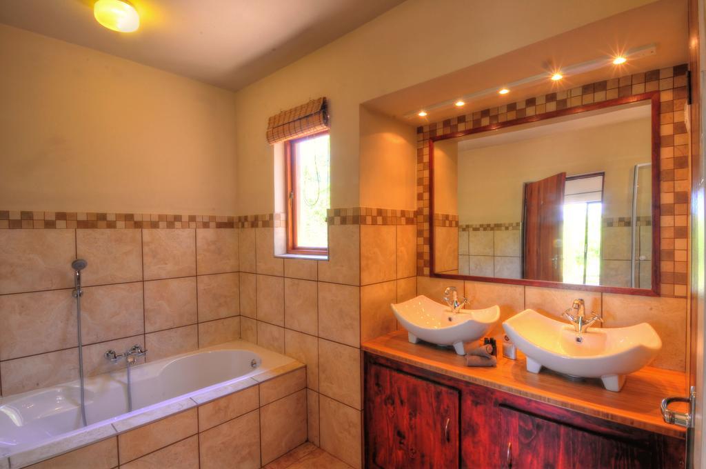 Cheetah Paw Eco Lodge Guernsey Nature Reserve Ruang foto