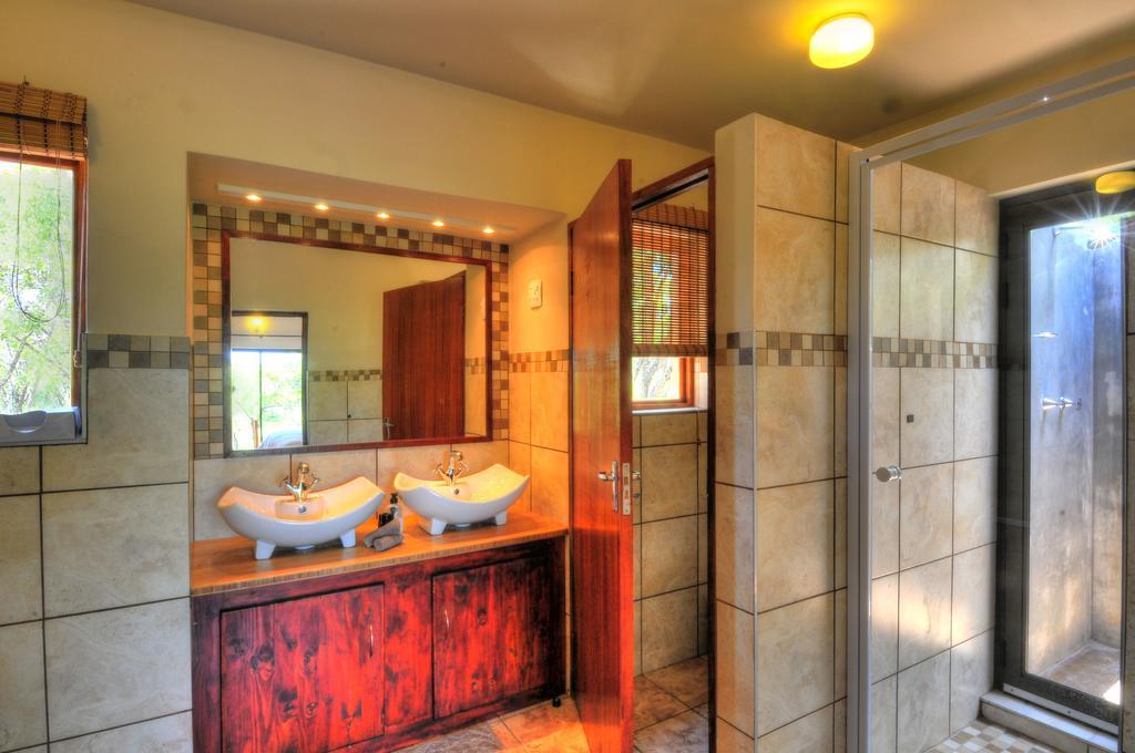 Cheetah Paw Eco Lodge Guernsey Nature Reserve Ruang foto